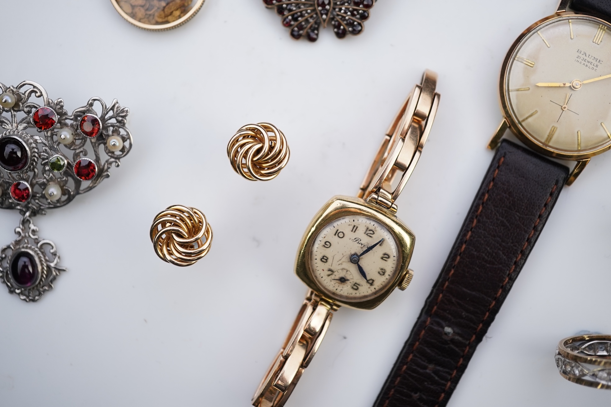 A group of jewellery and two watches